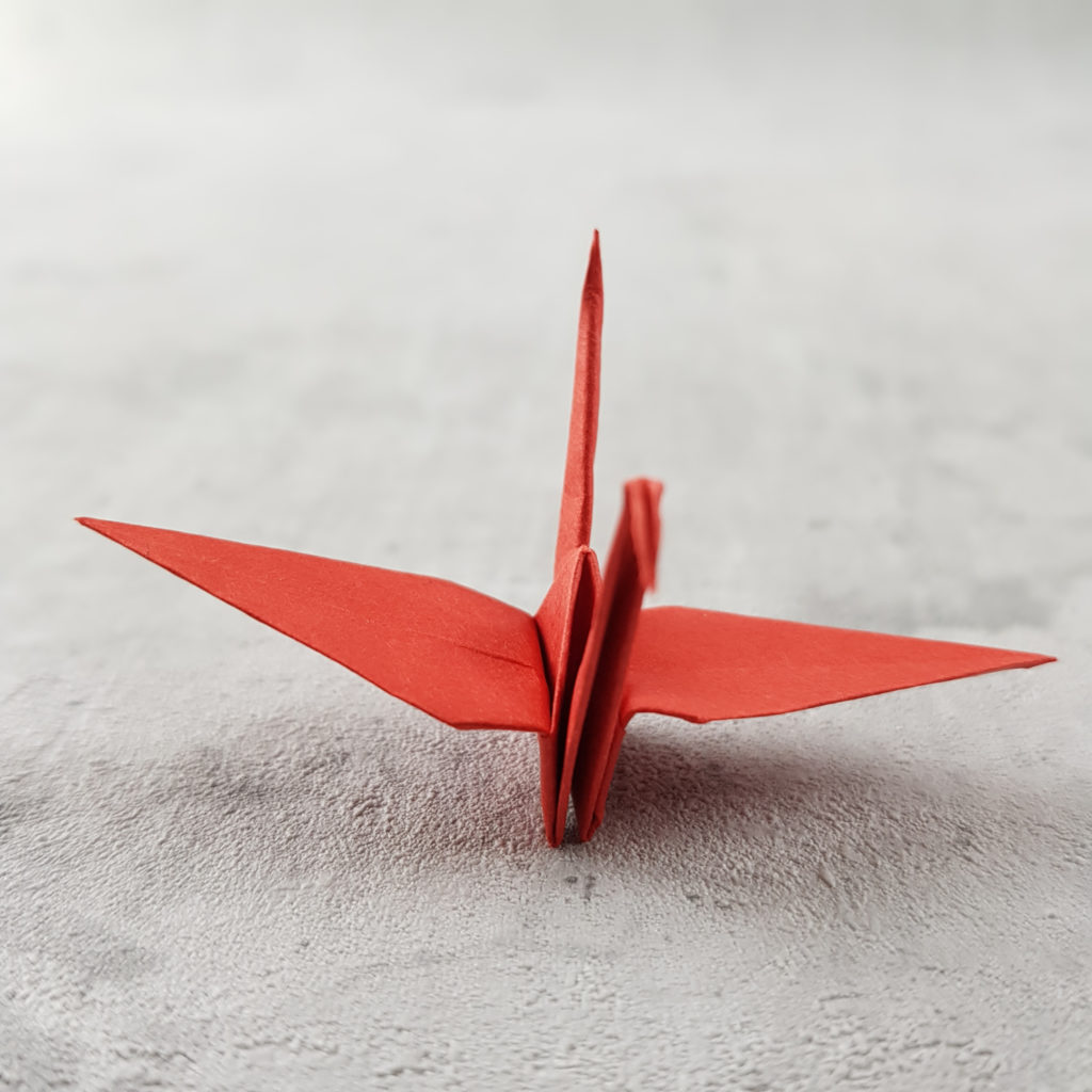 Origami Kranich Handschrift Flügel glatt